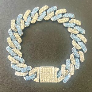 GORGEOUS CUBIC ZIRCONIA BLUE AND WHITE DIAMOND BRACELET. HAS MATCHING NECKLACE.